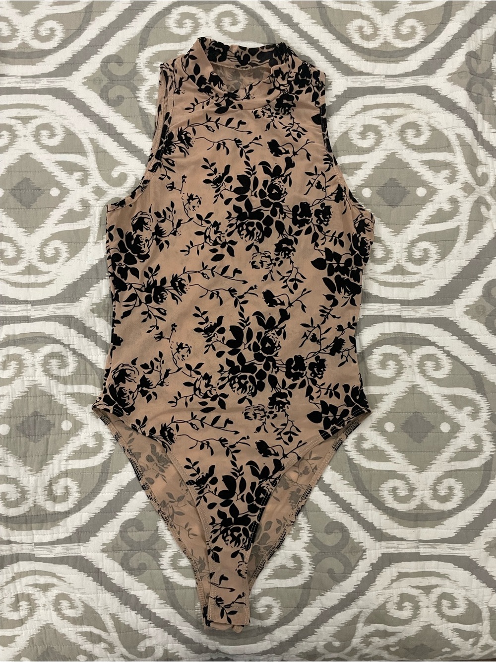 Sleeveless High-Neck Floral Bodysuit in Beige and Black